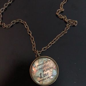 Long bronze world travel saying necklace